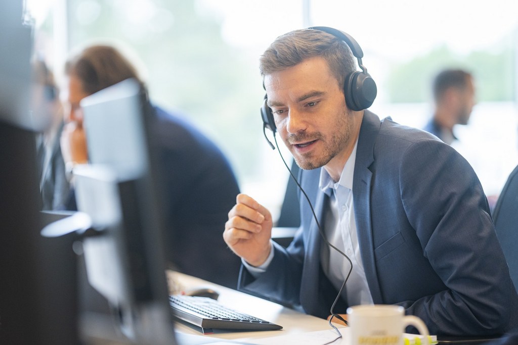 man talking through screen